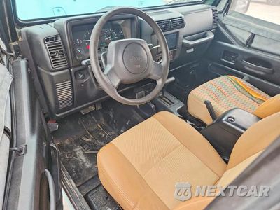 Zdjęcie 8 z 13 samochodu: 1997 JEEP WRANGLER / TJ SPORT VIN:1J4FY19S3VP521851 - miniatura