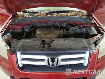 Zdjęcie 12 z 14 samochodu: 2006 HONDA PILOT EX VIN:2HKYF18426H523174 - miniatura