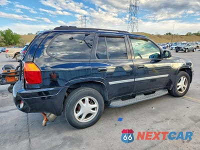 Trzecie zdjęcie samochodu z tyłu: 2007 GMC ENVOY VIN:1GKDT13S672139726 - miniatura