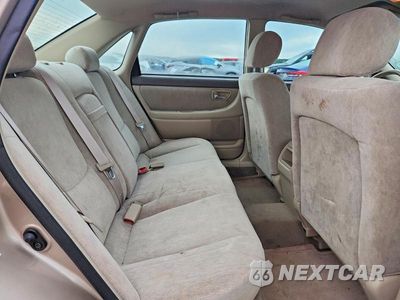 Zdjęcie 10 z 13 samochodu: 2002 TOYOTA AVALON XL VIN:4T1BF28B22U204931 - miniatura