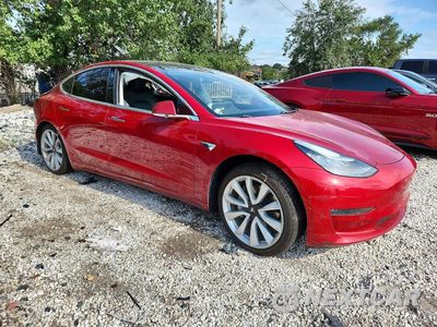 Czwarte zdjęcie samochodu z boku: 2018 TESLA MODEL 3 VIN:5YJ3E1EA8JF015502 - miniatura