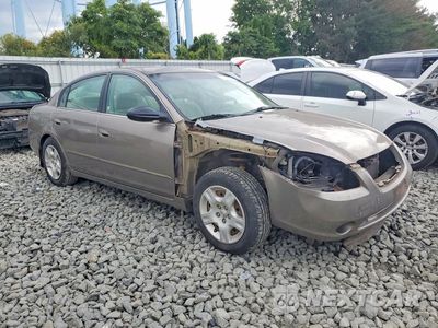 Czwarte zdjęcie samochodu z boku: 2003 NISSAN ALTIMA 2.5 VIN:1N4AL11D53C264827 - miniatura