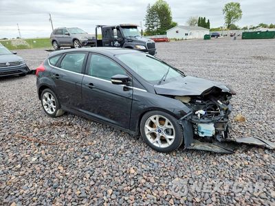 Czwarte zdjęcie samochodu z boku: 2014 FORD FOCUS TITANIUM VIN:1FADP3N29EL192684 - miniatura
