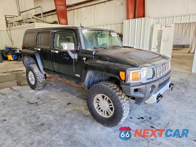 Czwarte zdjęcie samochodu z boku: 2009 HUMMER H3 VIN:5GTEN13EX98150533 - miniatura