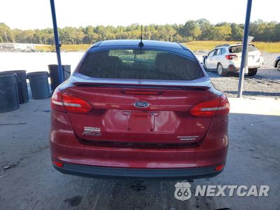 Zdjęcie 6 z 12 samochodu: 2016 FORD FOCUS TITANIUM VIN:1FADP3J28GL287763 - miniatura