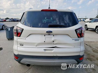 Zdjęcie 6 z 12 samochodu: 2017 FORD ESCAPE TITANIUM VIN:1FMCU0J9XHUD40268 - miniatura