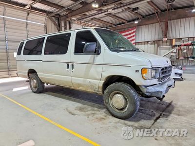 Czwarte zdjęcie samochodu z boku: 2001 FORD ECONOLINE E350 SUPER DUTY WAGON VIN:1FBSS31L11HA61636 - miniatura