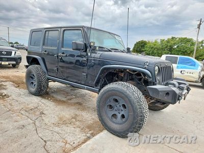 Czwarte zdjęcie samochodu z boku: 2009 JEEP WRANGLER UNLIMITED VIN:1J4GA69129L778705 - miniatura