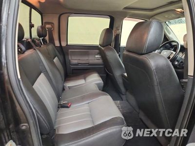 Zdjęcie 10 z 13 samochodu: 2008 DODGE DAKOTA QUAD LARAMIE VIN:1D7HW58N98S544615 - miniatura