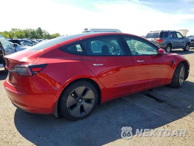 Trzecie zdjęcie samochodu z tyłu: 2021 TESLA MODEL 3 VIN:5YJ3E1EA7MF943113 - miniatura