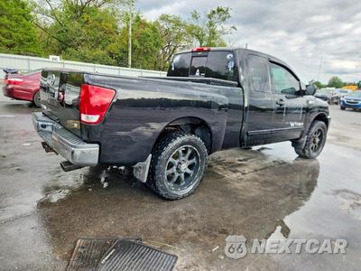 Trzecie zdjęcie samochodu z tyłu: 2011 NISSAN TITAN SV VIN:1N6BA0CAXBN313103 - miniatura