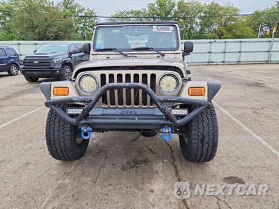 Piąte zdjęcie samochodu w środku: 2004 JEEP WRANGLER / TJ SAHARA VIN:1J4FA59S74P716202 - miniatura