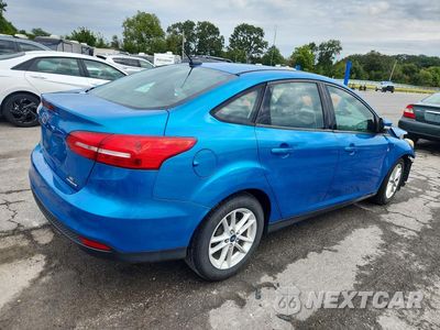 Trzecie zdjęcie samochodu z tyłu: 2015 FORD FOCUS SE VIN:1FADP3F22FL230014 - miniatura