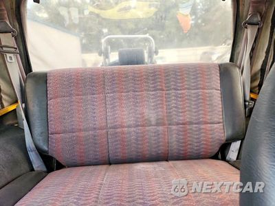 Zdjęcie 10 z 13 samochodu: 2000 JEEP WRANGLER / TJ SPORT VIN:1J4FA49S4YP754518 - miniatura
