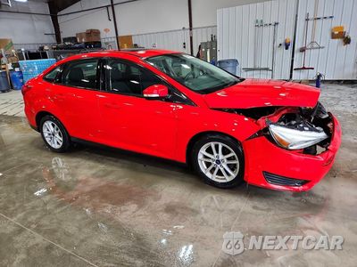 Czwarte zdjęcie samochodu z boku: 2016 FORD FOCUS SE VIN:1FADP3F29GL279843 - miniatura