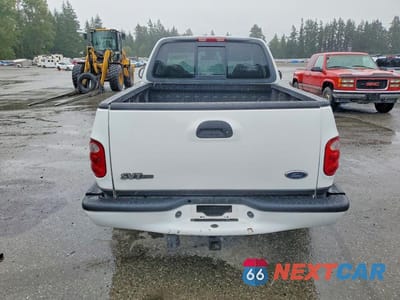 Zdjęcie 6 z 12 samochodu: 2000 FORD F150 SVT LIGHTNING VIN:2FTZF0738YCA82702 - miniatura