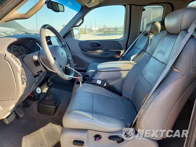 Zdjęcie 7 z 12 samochodu: 2001 FORD F150 VIN:1FTRX18L91NB75441 - miniatura