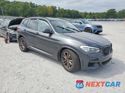 Czwarte zdjęcie samochodu z boku: 2021 BMW X3 SDRIVE30I VIN:5UXTY3C02M9F33988 - miniatura