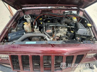 Zdjęcie 12 z 14 samochodu: 2000 JEEP CHEROKEE SPORT VIN:1J4FT48S5YL268741 - miniatura