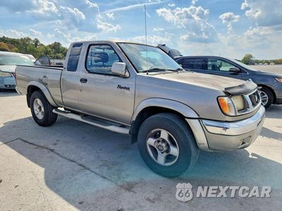 Czwarte zdjęcie samochodu z boku: 2000 NISSAN FRONTIER XE DESERT RUNNER VIN:1N6ED26T5YC329940 - miniatura