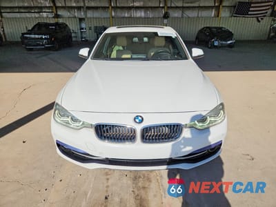 Piąte zdjęcie samochodu w środku: 2017 BMW 330E VIN:WBA8E1C56HK480088 - miniatura