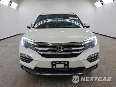 Piąte zdjęcie samochodu w środku: 2017 HONDA PILOT ELITE VIN:5FNYF6H00HB105336 - miniatura