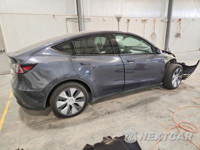 Trzecie zdjęcie samochodu z tyłu: 2023 TESLA MODEL Y VIN:7SAYGAEE3PF840670 - miniatura