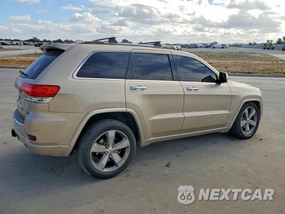 Trzecie zdjęcie samochodu z tyłu: 2014 JEEP GRAND CHEROKEE OVERLAND VIN:1C4RJFCG7EC237350 - miniatura