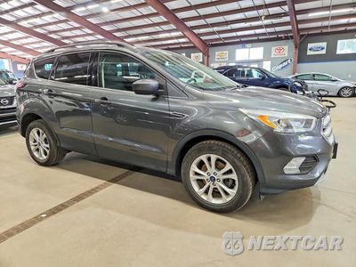 Czwarte zdjęcie samochodu z boku: 2018 FORD ESCAPE SEL VIN:1FMCU0HD3JUB04738 - miniatura
