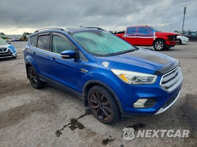 Czwarte zdjęcie samochodu z boku: 2017 FORD ESCAPE TITANIUM VIN:1FMCU0J98HUA75852 - miniatura