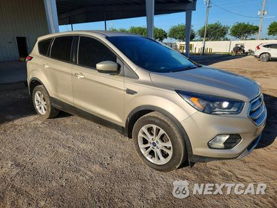 Czwarte zdjęcie samochodu z boku: 2017 FORD ESCAPE SE VIN:1FMCU0GD8HUB66101 - miniatura