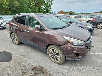 Czwarte zdjęcie samochodu z boku: 2014 HYUNDAI TUCSON LIMITED VIN:KM8JUCAG9EU844121 - miniatura