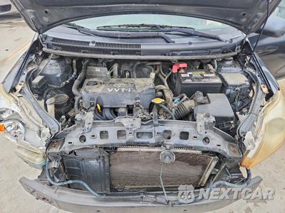 Zdjęcie 11 z 13 samochodu: 2009 TOYOTA YARIS BASE VIN:JTDBT903594045049 - miniatura