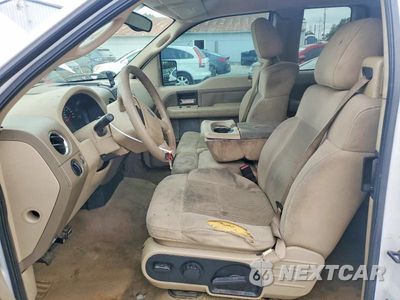 Zdjęcie 7 z 12 samochodu: 2004 FORD F150 VIN:1FTPX12504NA54805 - miniatura