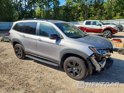 Czwarte zdjęcie samochodu z boku: 2022 HONDA PILOT TRAILSPORT VIN:5FNYF6H84NB023076 - miniatura