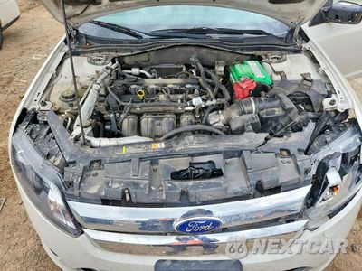 Zdjęcie 11 z 12 samochodu: 2011 FORD FUSION SE VIN:3FAHP0HA9BR231497 - miniatura