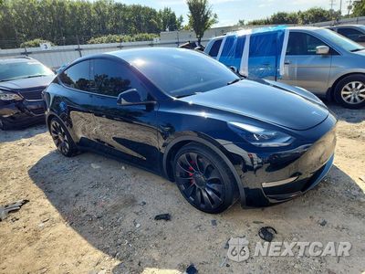Czwarte zdjęcie samochodu z boku: 2023 TESLA MODEL Y VIN:7SAYGDEF6PF842746 - miniatura