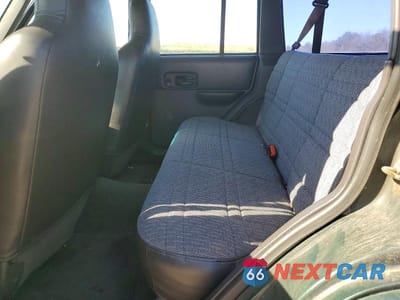 Zdjęcie 11 z 13 samochodu: 2000 JEEP CHEROKEE SPORT VIN:1J4FF48SXYL194420 - miniatura
