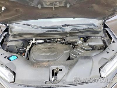 Zdjęcie 12 z 13 samochodu: 2021 HONDA PILOT SE VIN:5FNYF6H21MB067210 - miniatura