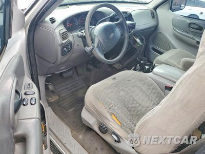 Zdjęcie 8 z 12 samochodu: 1999 FORD F150 VIN:1FTRX17W0XKB74913 - miniatura