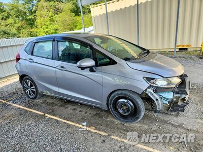 Czwarte zdjęcie samochodu z boku: 2018 HONDA FIT EX VIN:3HGGK5H81JM707530 - miniatura