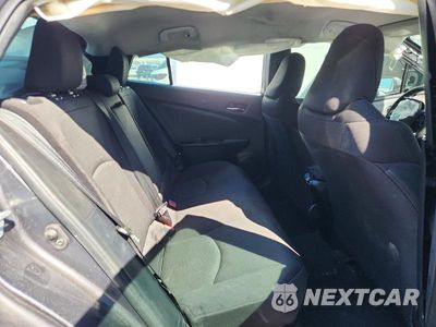 Zdjęcie 10 z 12 samochodu: 2021 TOYOTA PRIUS L ECO VIN:JTDKAMFU4M3127197 - miniatura