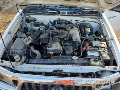 Zdjęcie 11 z 12 samochodu: 2002 TOYOTA TACOMA BASE VIN:5TEPM62N92Z076351 - miniatura