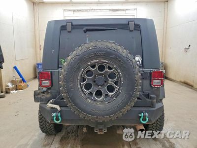 Zdjęcie 6 z 13 samochodu: 2010 JEEP WRANGLER UNLIMITED SAHARA VIN:1J4BA5H13AL143860 - miniatura