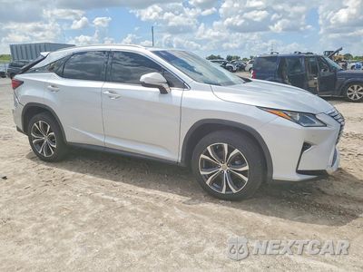 Czwarte zdjęcie samochodu z boku: 2017 LEXUS RX 350 BASE VIN:2T2ZZMCA0HC061385 - miniatura