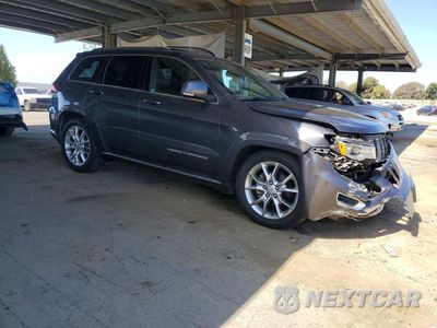 Czwarte zdjęcie samochodu z boku: 2015 JEEP GRAND CHEROKEE SUMMIT VIN:1C4RJFJG1FC888252 - miniatura
