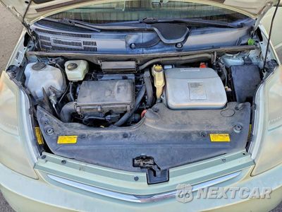 Zdjęcie 11 z 12 samochodu: 2007 TOYOTA PRIUS TOURING VIN:JTDKB20U273271457 - miniatura