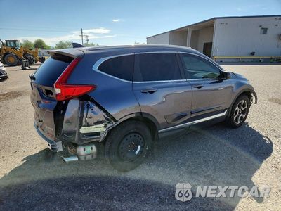 Trzecie zdjęcie samochodu z tyłu: 2018 HONDA CR-V TOURING VIN:7FARW1H97JE041778 - miniatura