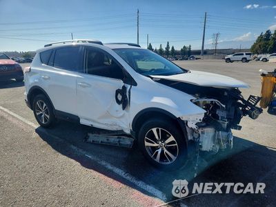 Czwarte zdjęcie samochodu z boku: 2017 TOYOTA RAV4 XLE VIN:2T3RFREVXHW587698 - miniatura