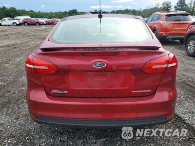 Zdjęcie 6 z 12 samochodu: 2015 FORD FOCUS TITANIUM VIN:1FADP3J24FL273681 - miniatura
